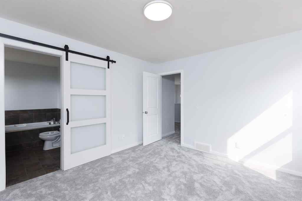 MLS® A2253409 - 2461 Ravenswood View SE in Ravenswood Airdrie, Residential