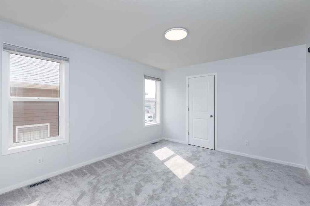 MLS® A2253409 - 2461 Ravenswood View SE in Ravenswood Airdrie, Residential