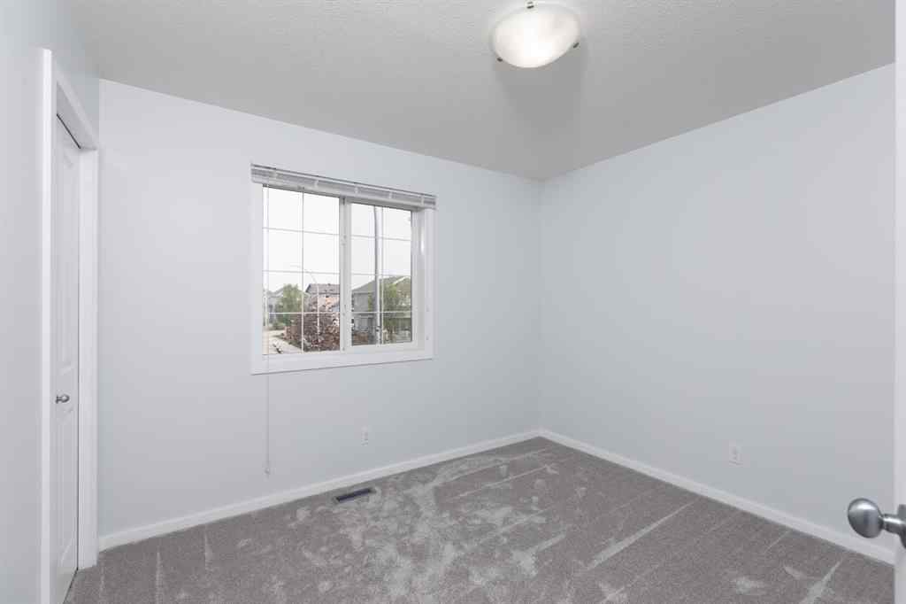 MLS® A2253409 - 2461 Ravenswood View SE in Ravenswood Airdrie, Residential