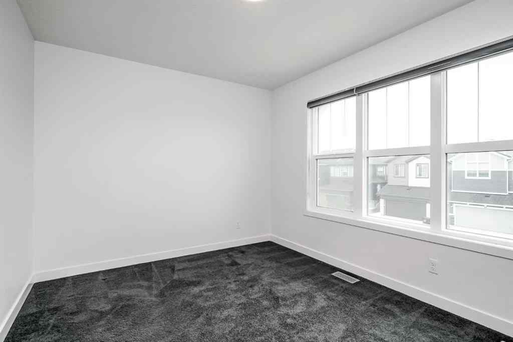 MLS® A2253410 - 34 Belmont Crescent SW in Belmont Calgary, Residential