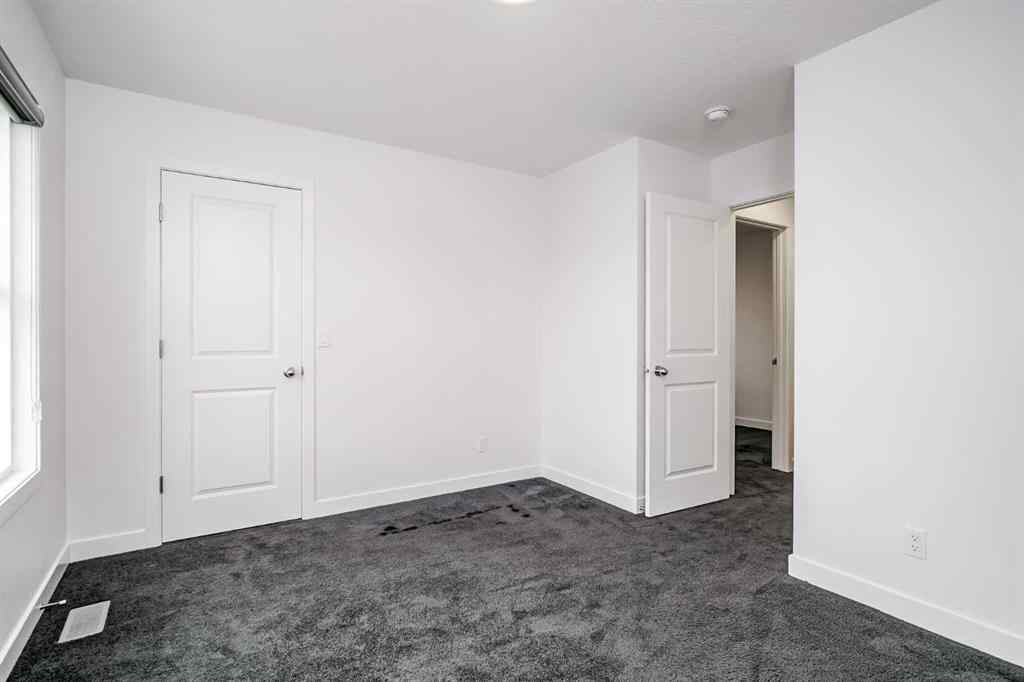 MLS® A2253410 - 34 Belmont Crescent SW in Belmont Calgary, Residential