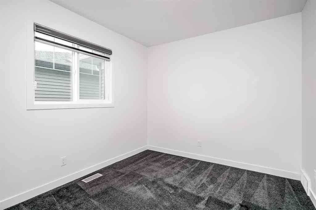 MLS® A2253410 - 34 Belmont Crescent SW in Belmont Calgary, Residential