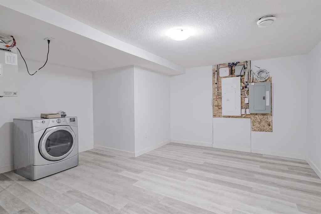MLS® A2253410 - 34 Belmont Crescent SW in Belmont Calgary, Residential