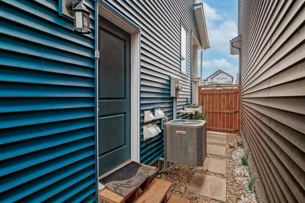 MLS® A2253410 - 34 Belmont Crescent SW in Belmont Calgary, Residential