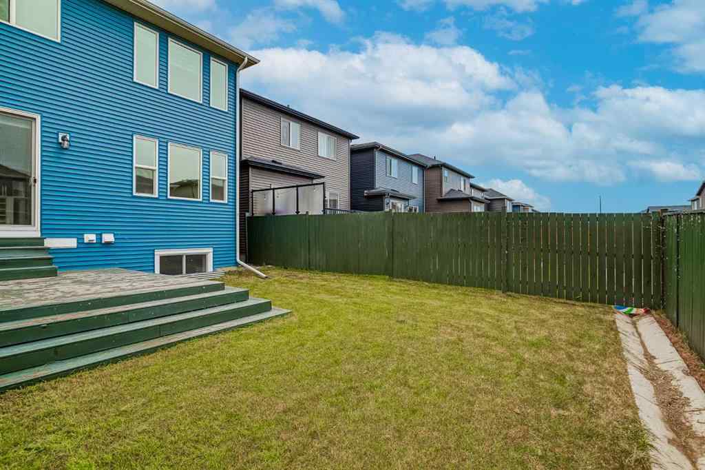 MLS® A2253410 - 34 Belmont Crescent SW in Belmont Calgary, Residential