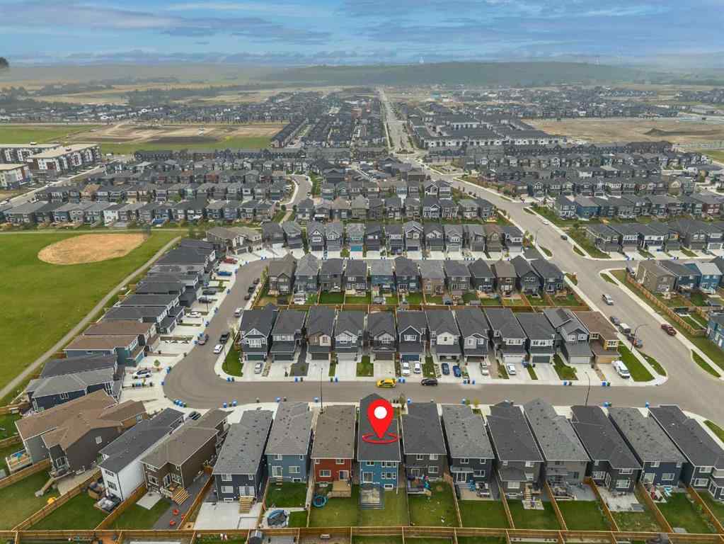 MLS® A2253410 - 34 Belmont Crescent SW in Belmont Calgary, Residential