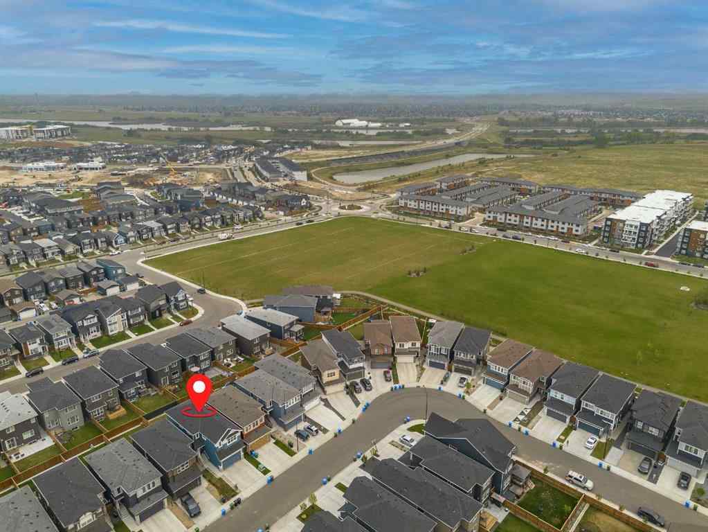 MLS® A2253410 - 34 Belmont Crescent SW in Belmont Calgary, Residential