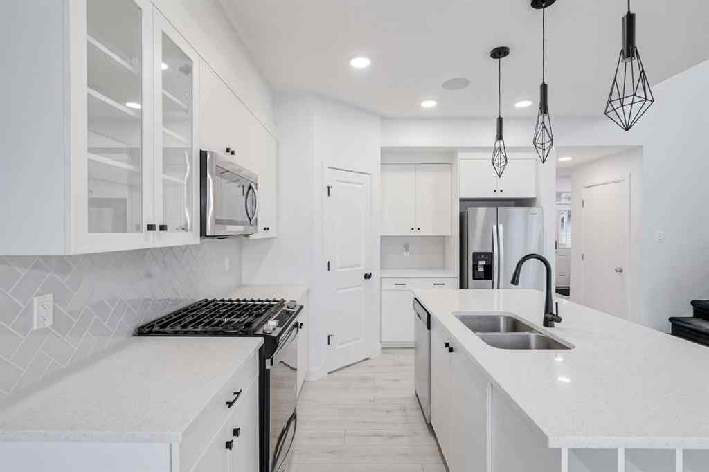 MLS® A2253410 - 34 Belmont Crescent SW in Belmont Calgary, Residential