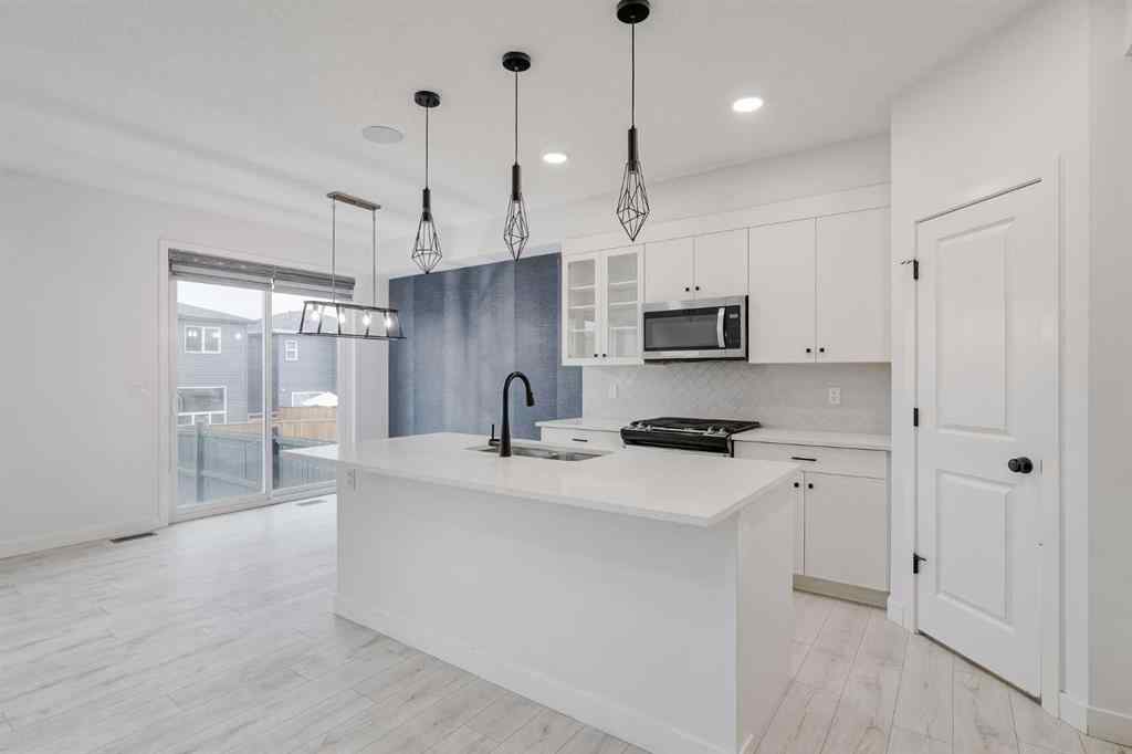 MLS® A2253410 - 34 Belmont Crescent SW in Belmont Calgary, Residential