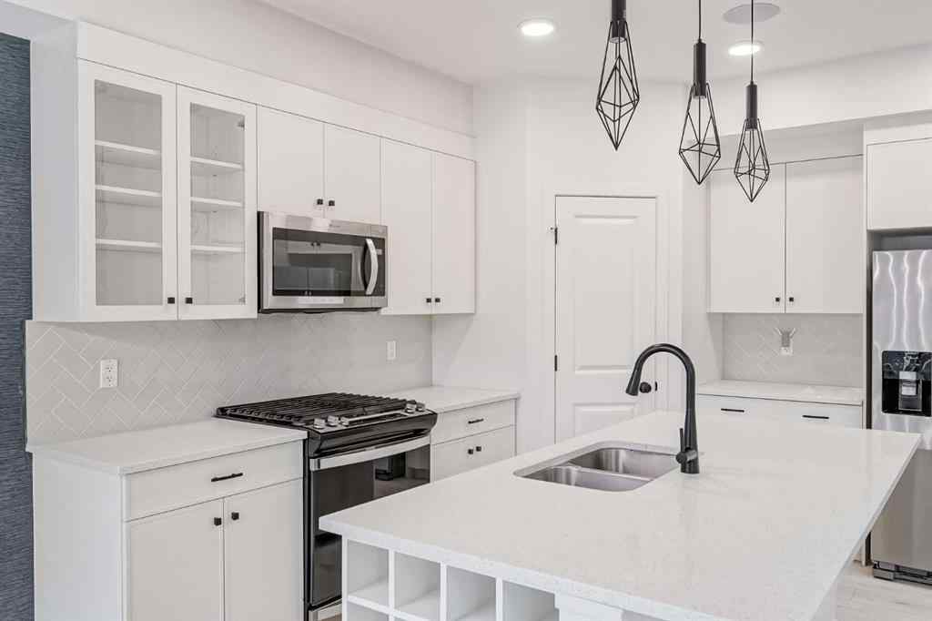 MLS® A2253410 - 34 Belmont Crescent SW in Belmont Calgary, Residential