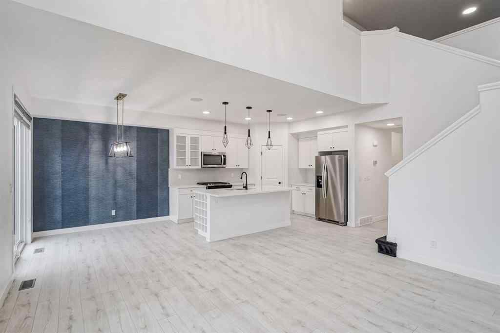 MLS® A2253410 - 34 Belmont Crescent SW in Belmont Calgary, Residential
