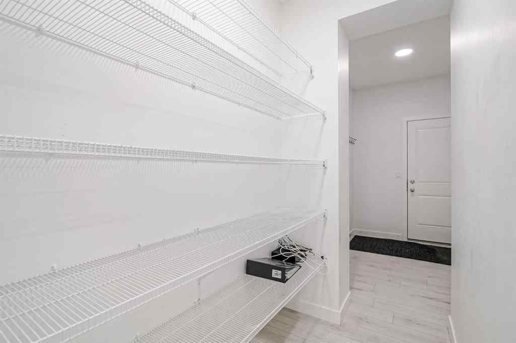 MLS® A2253410 - 34 Belmont Crescent SW in Belmont Calgary, Residential