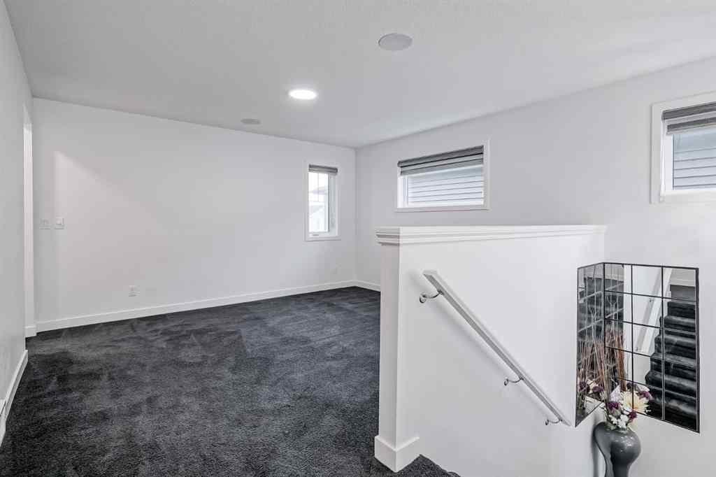 MLS® A2253410 - 34 Belmont Crescent SW in Belmont Calgary, Residential