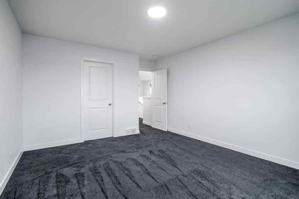 MLS® A2253410 - 34 Belmont Crescent SW in Belmont Calgary, Residential