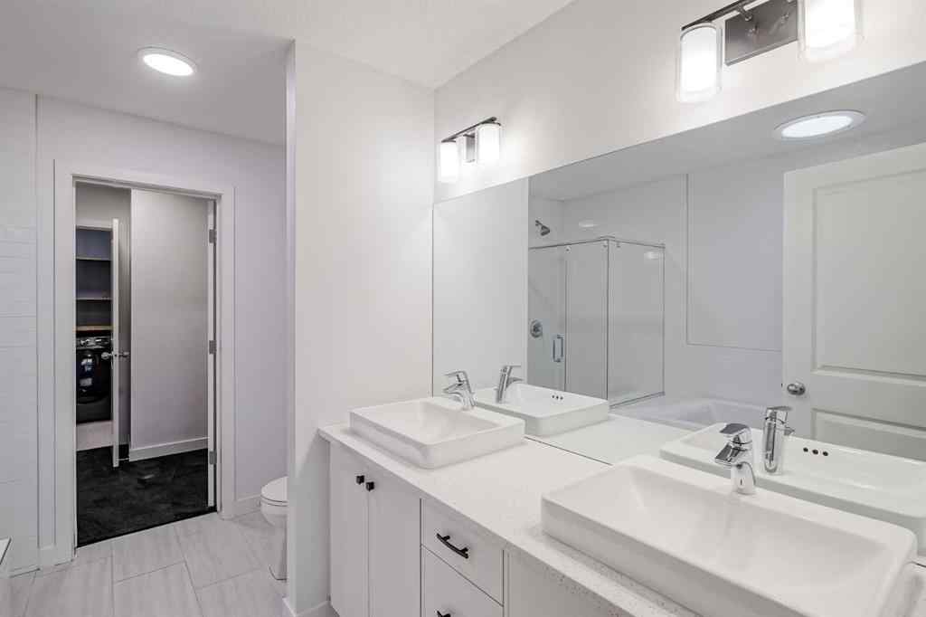 MLS® A2253410 - 34 Belmont Crescent SW in Belmont Calgary, Residential
