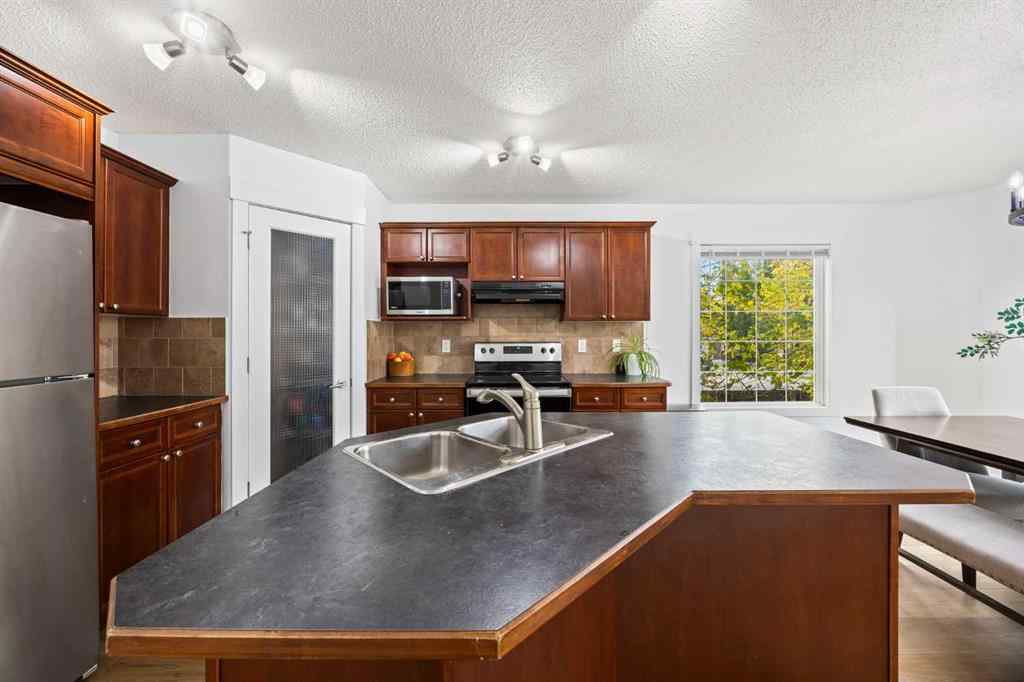 MLS® A2253422 - 93 Crystal Shores Heights  in Crystal Shores Okotoks, Residential