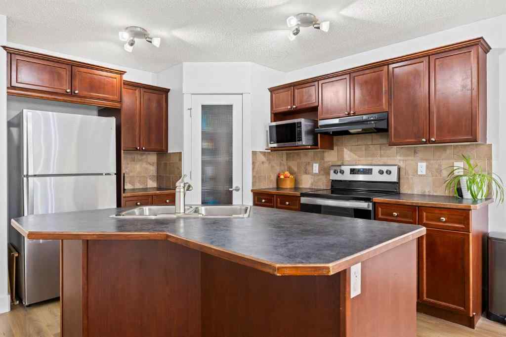 MLS® A2253422 - 93 Crystal Shores Heights  in Crystal Shores Okotoks, Residential