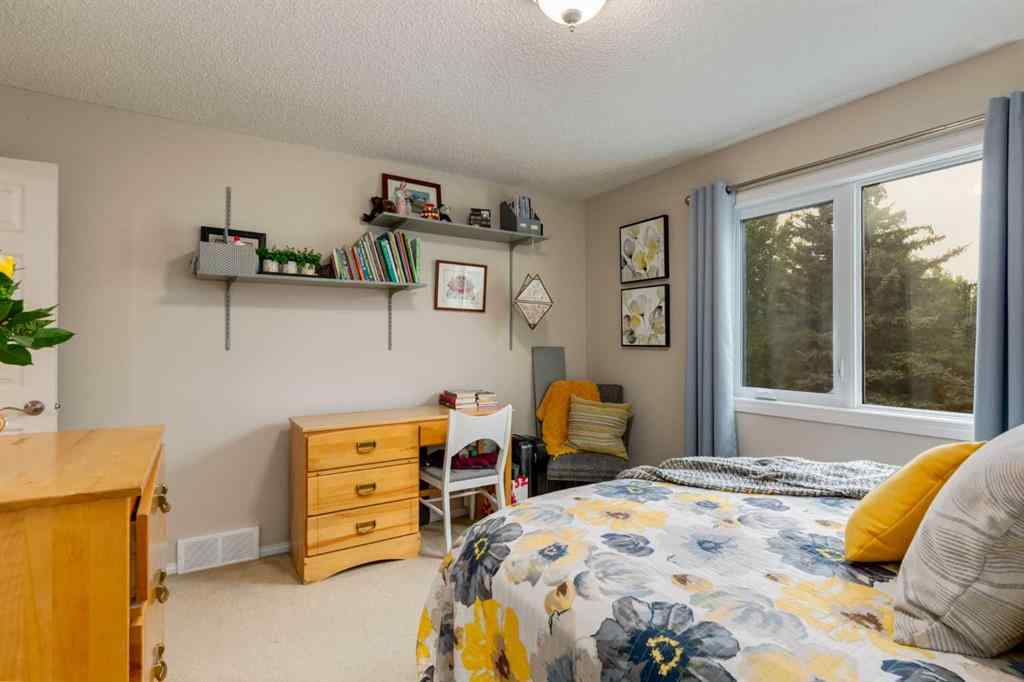 MLS® A2253429 - 215 Alandale Place SW in NONE Rural Rocky View County, Residential
