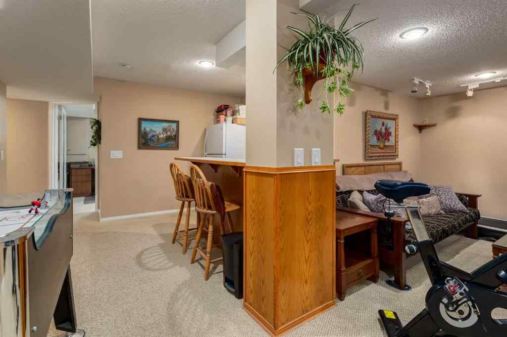 MLS® A2253429 - 215 Alandale Place SW in NONE Rural Rocky View County, Residential