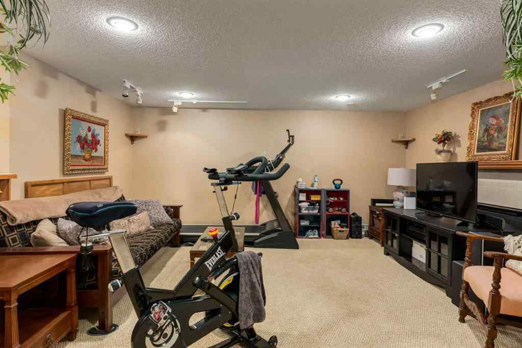 MLS® A2253429 - 215 Alandale Place SW in NONE Rural Rocky View County, Residential