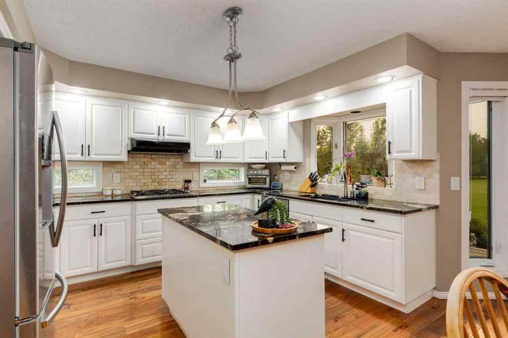 MLS® A2253429 - 215 Alandale Place SW in NONE Rural Rocky View County, Residential