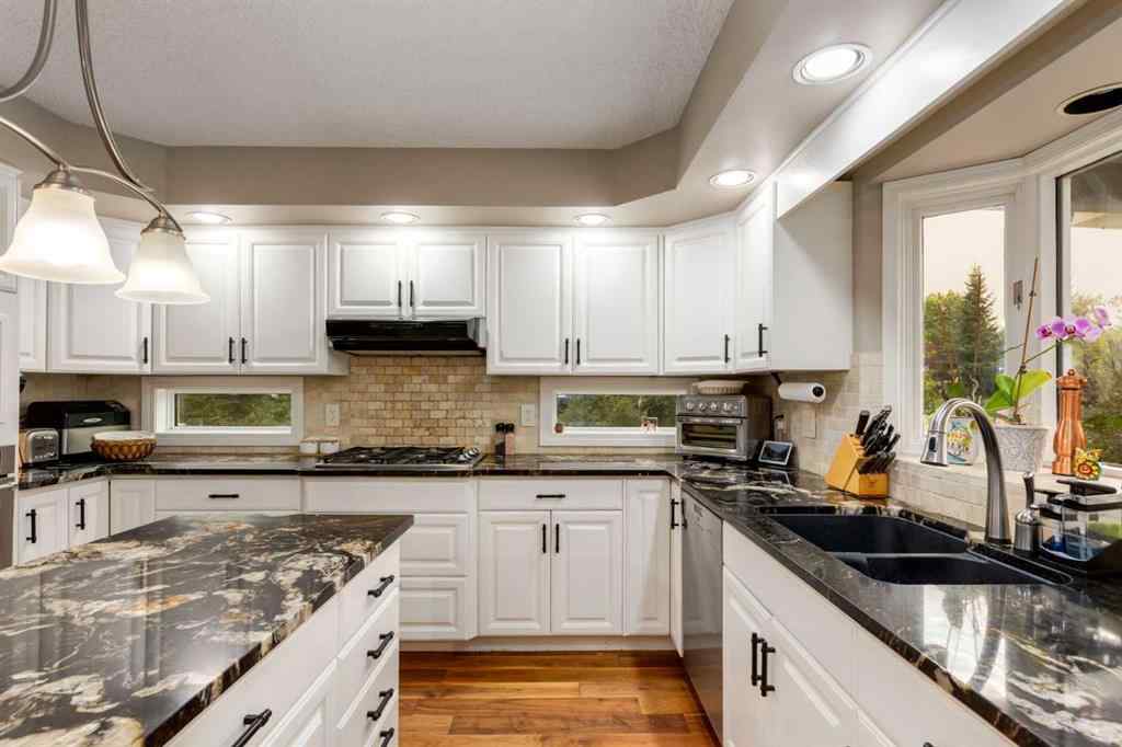 MLS® A2253429 - 215 Alandale Place SW in NONE Rural Rocky View County, Residential