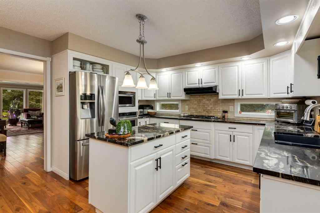 MLS® A2253429 - 215 Alandale Place SW in NONE Rural Rocky View County, Residential