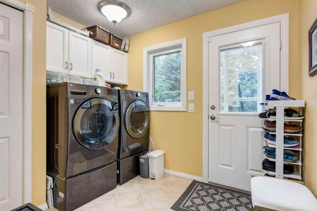 MLS® A2253429 - 215 Alandale Place SW in NONE Rural Rocky View County, Residential