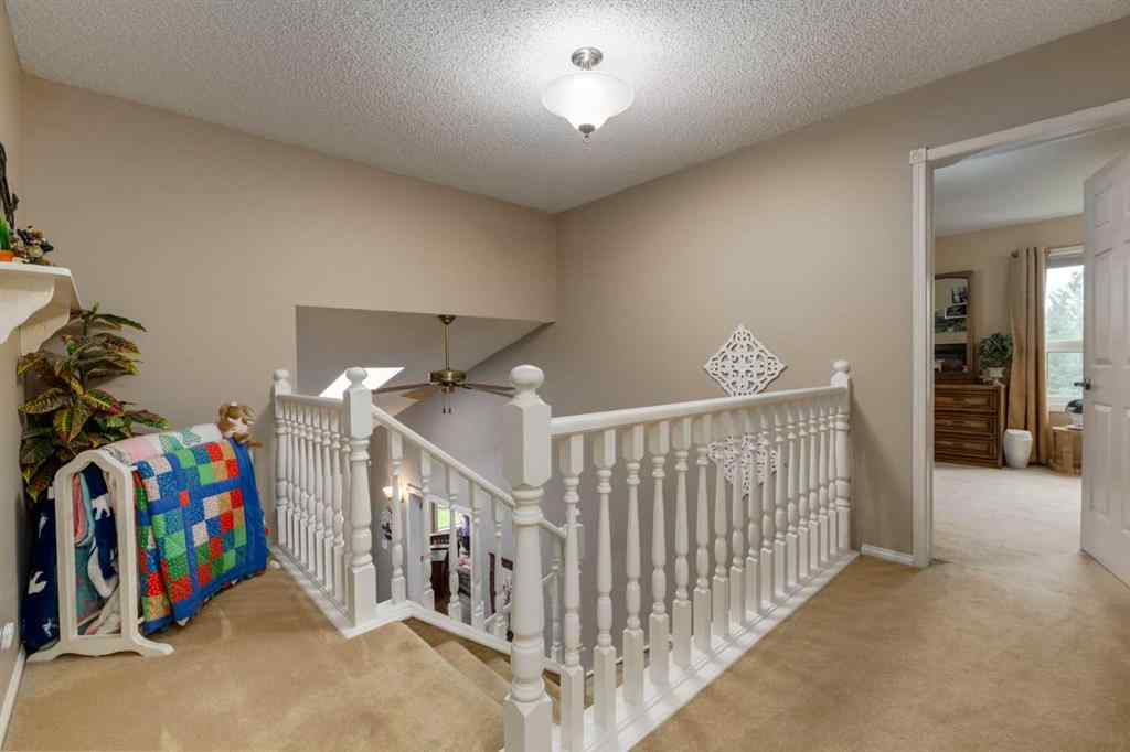 MLS® A2253429 - 215 Alandale Place SW in NONE Rural Rocky View County, Residential