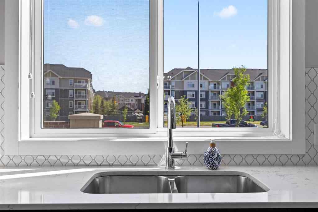 MLS® A2253437 - 606 Redstone Crescent NE in Redstone Calgary, Residential