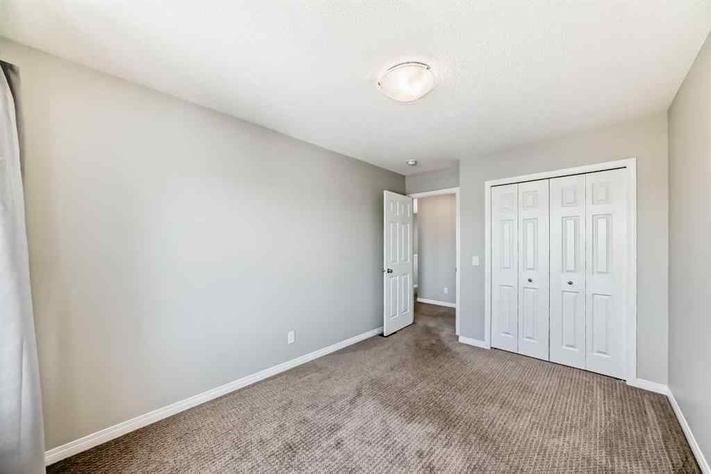 MLS® A2253455 - 581 Hillcrest Road SW in Hillcrest Airdrie, Residential