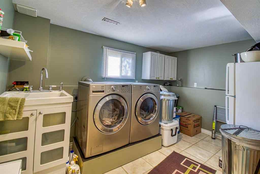MLS® A2253459 - 718 Oak Drive   in N/A Beaverlodge, Residential