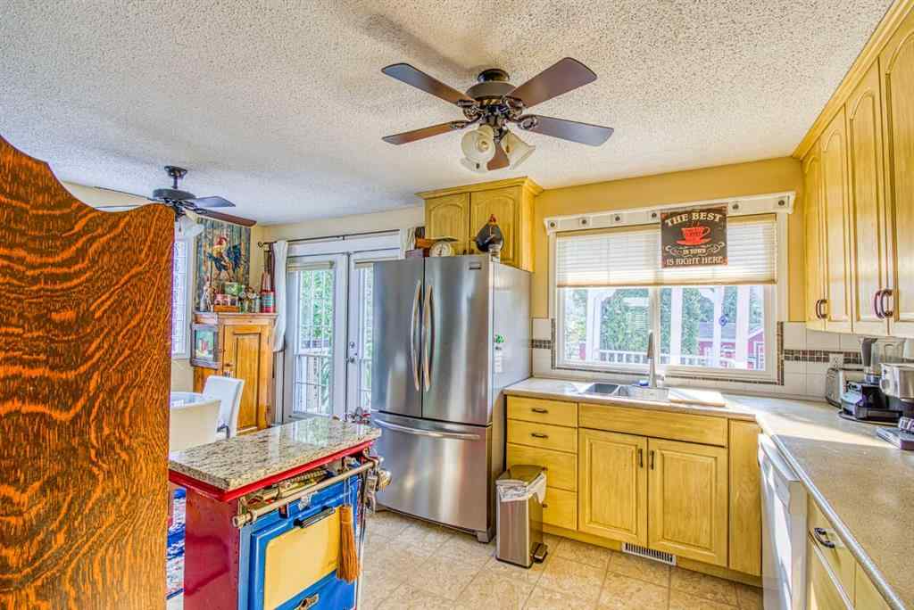 MLS® A2253459 - 718 Oak Drive   in N/A Beaverlodge, Residential