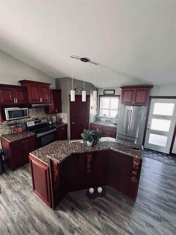 MLS® A2253465 - 223 15 Street E in Meadowbrook Brooks, Residential