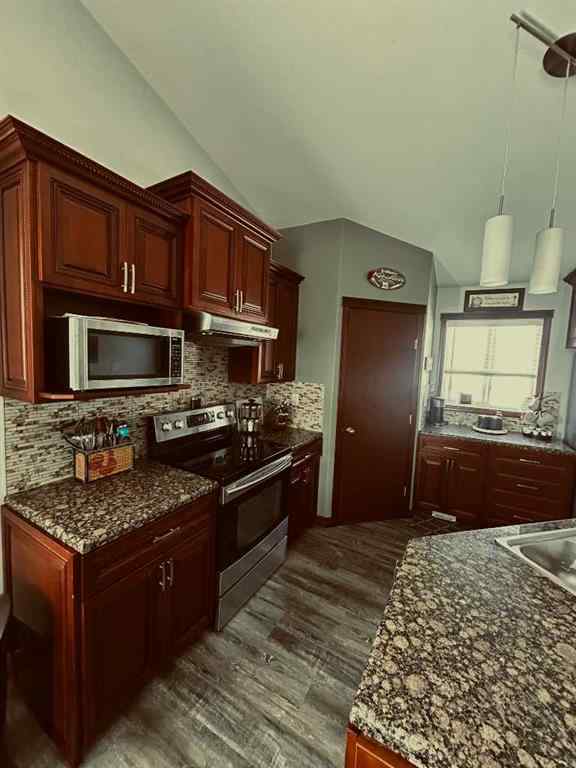 MLS® A2253465 - 223 15 Street E in Meadowbrook Brooks, Residential