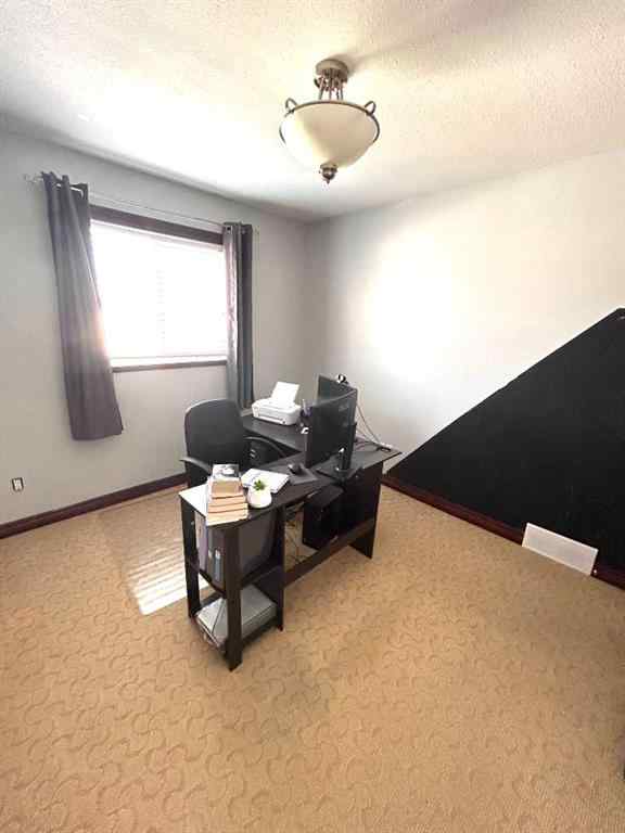 MLS® A2253465 - 223 15 Street E in Meadowbrook Brooks, Residential