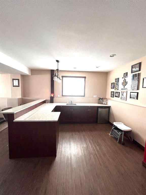 MLS® A2253465 - 223 15 Street E in Meadowbrook Brooks, Residential