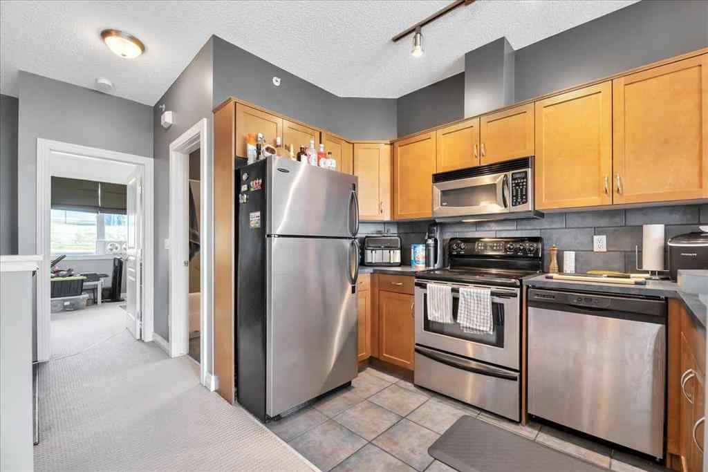 MLS® A2253480 - Unit #8 108 Rockyledge View NW in Rocky Ridge Calgary, Residential