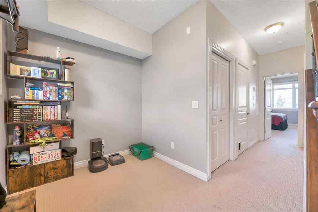 MLS® A2253480 - Unit #8 108 Rockyledge View NW in Rocky Ridge Calgary, Residential