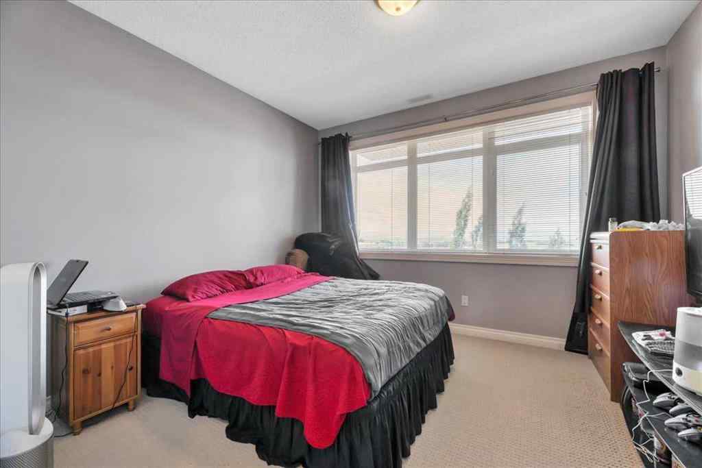 MLS® A2253480 - Unit #8 108 Rockyledge View NW in Rocky Ridge Calgary, Residential