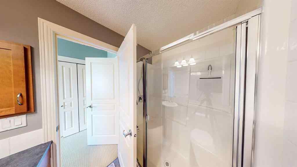 MLS® A2253480 - Unit #8 108 Rockyledge View NW in Rocky Ridge Calgary, Residential