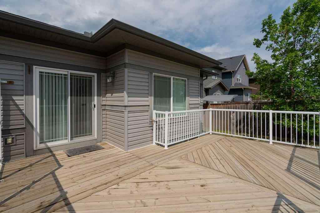 MLS® A2253501 - 1402 Ravenscroft Avenue SE in Ravenswood Airdrie, Residential