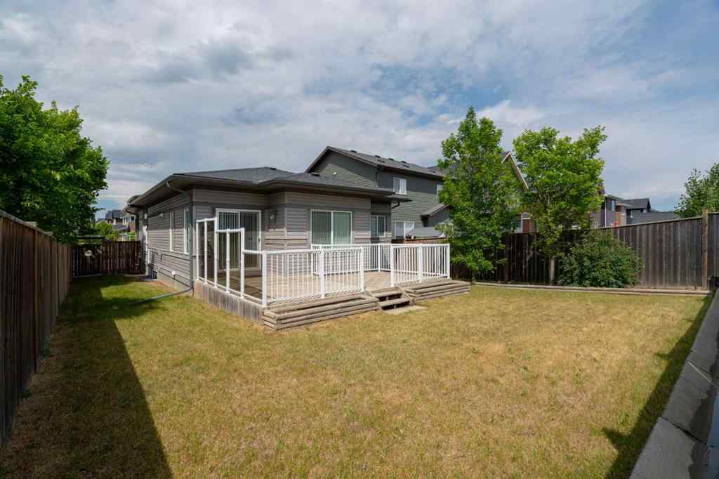MLS® A2253501 - 1402 Ravenscroft Avenue SE in Ravenswood Airdrie, Residential