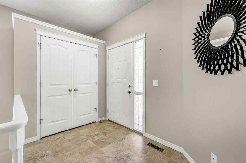 MLS® A2253501 - 1402 Ravenscroft Avenue SE in Ravenswood Airdrie, Residential