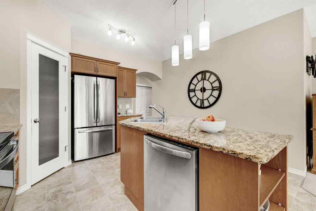 MLS® A2253501 - 1402 Ravenscroft Avenue SE in Ravenswood Airdrie, Residential