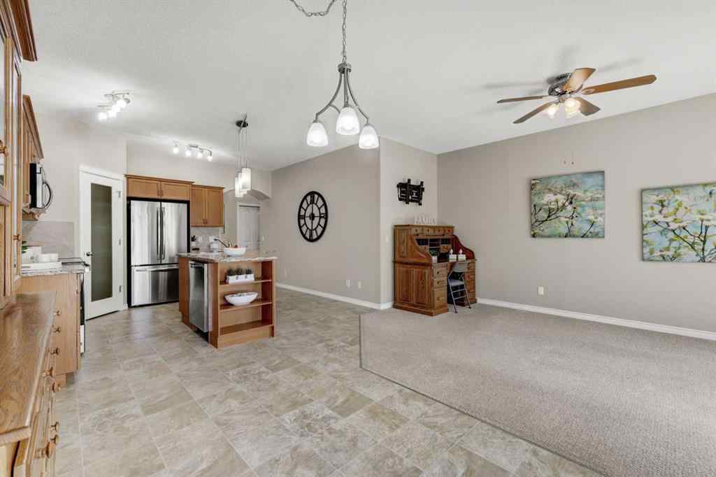 MLS® A2253501 - 1402 Ravenscroft Avenue SE in Ravenswood Airdrie, Residential