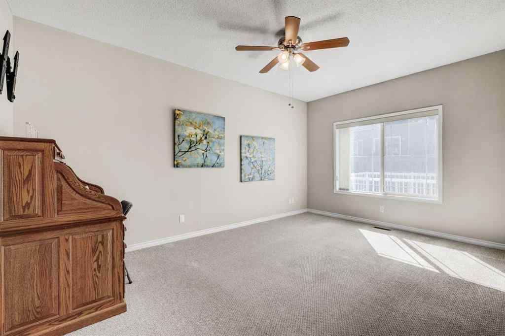 MLS® A2253501 - 1402 Ravenscroft Avenue SE in Ravenswood Airdrie, Residential