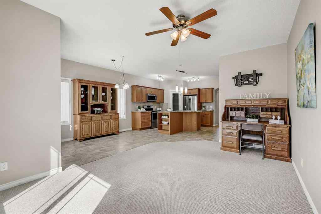 MLS® A2253501 - 1402 Ravenscroft Avenue SE in Ravenswood Airdrie, Residential