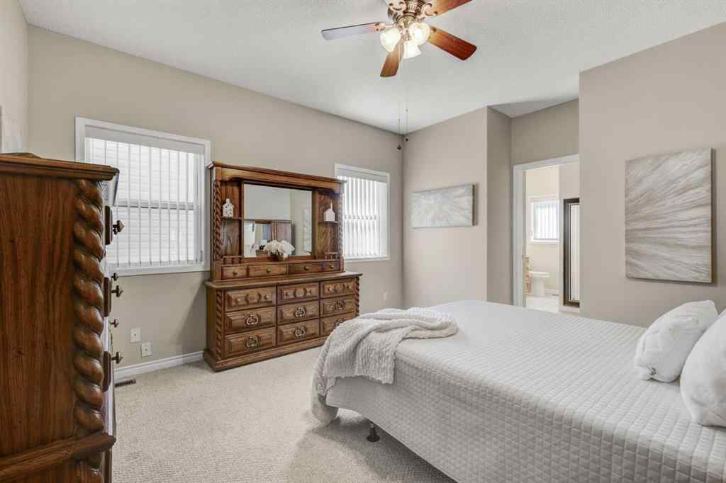 MLS® A2253501 - 1402 Ravenscroft Avenue SE in Ravenswood Airdrie, Residential