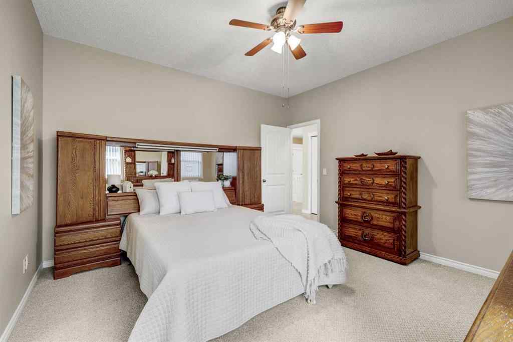MLS® A2253501 - 1402 Ravenscroft Avenue SE in Ravenswood Airdrie, Residential